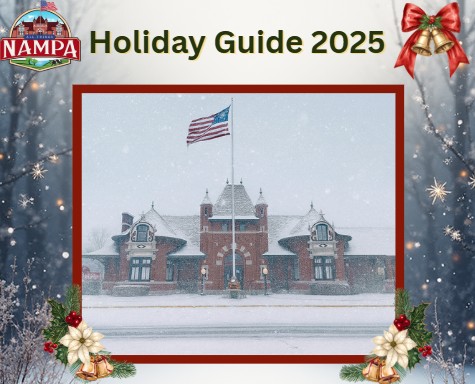 Historic Nampa Train Depot covered in snow with holiday decorations for the 2025 Holiday Guide.