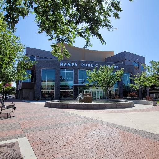 Nampa Public Library building in downtown Nampa, Idaho, with outdoor plaza and trees