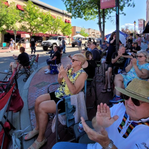 People enjoying live music during the Third Thursday event in downtown Nampa, Idaho