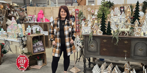 Debbie Tona at Tona Transformations in downtown Nampa surrounded by seasonal home decor and handcrafted displays
