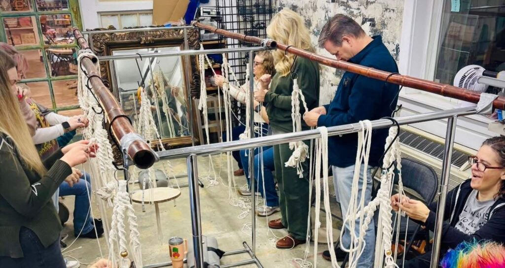 Macramé class at Tona Transformations Nampa with participants creating handmade decor during a creative workshop in downtown Nampa