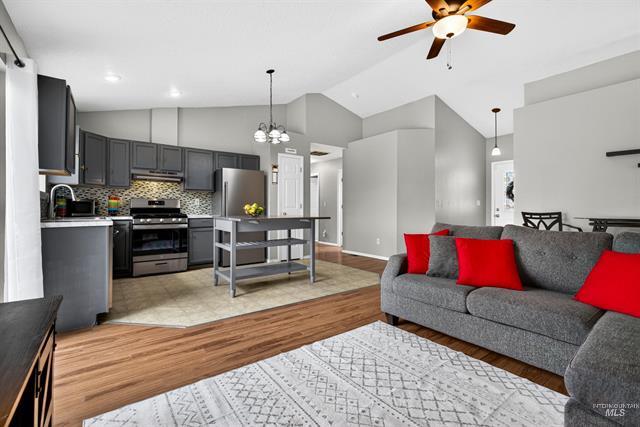 Open concept living room and kitchen at 2600 Muskrat Ave, Nampa, Idaho